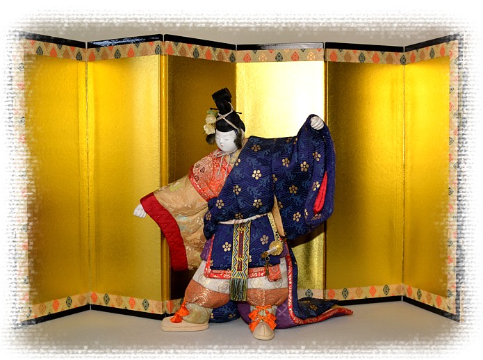 japanese traditional kimekomi doll of a dancing nobleman with sword