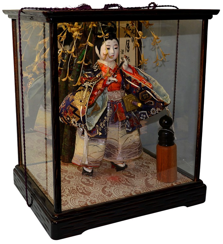 japanese antique doll od Yoshitsune with flute in his hands in glass box