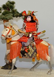 japanese antique doll of a Samurai on horse in glass box, 1920's
