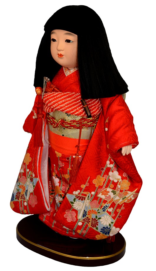 japanese ichimatsu doll of a girl dressed with festive attire