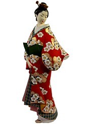 japanese hakata dol of a woman in red kimono with sakura motifl