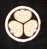 embroidered samurai crest on the kimono